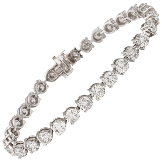 https://a.1stdibscdn.com/half-a-carat-each-three-prong-diamond-tennis-bracelet-for-sale/1121189/j_108559221606431716985/10855922_master.jpg