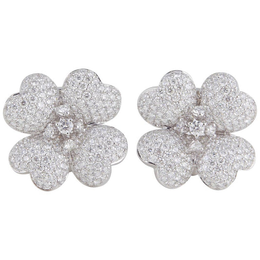 https://a.1stdibscdn.com/diamond-white-gold-flower-earrings-for-sale/1121189/j_114510421612563540772/11451042_master.jpg?width=768