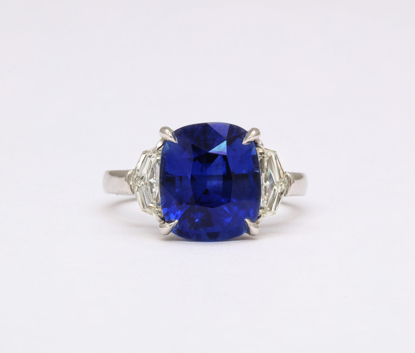 https://a.1stdibscdn.com/7-carat-cushion-cut-sapphire-and-diamond-ring-for-sale-picture-3/j_415/j_144397121641926940374/6R1A8301_master.jpg