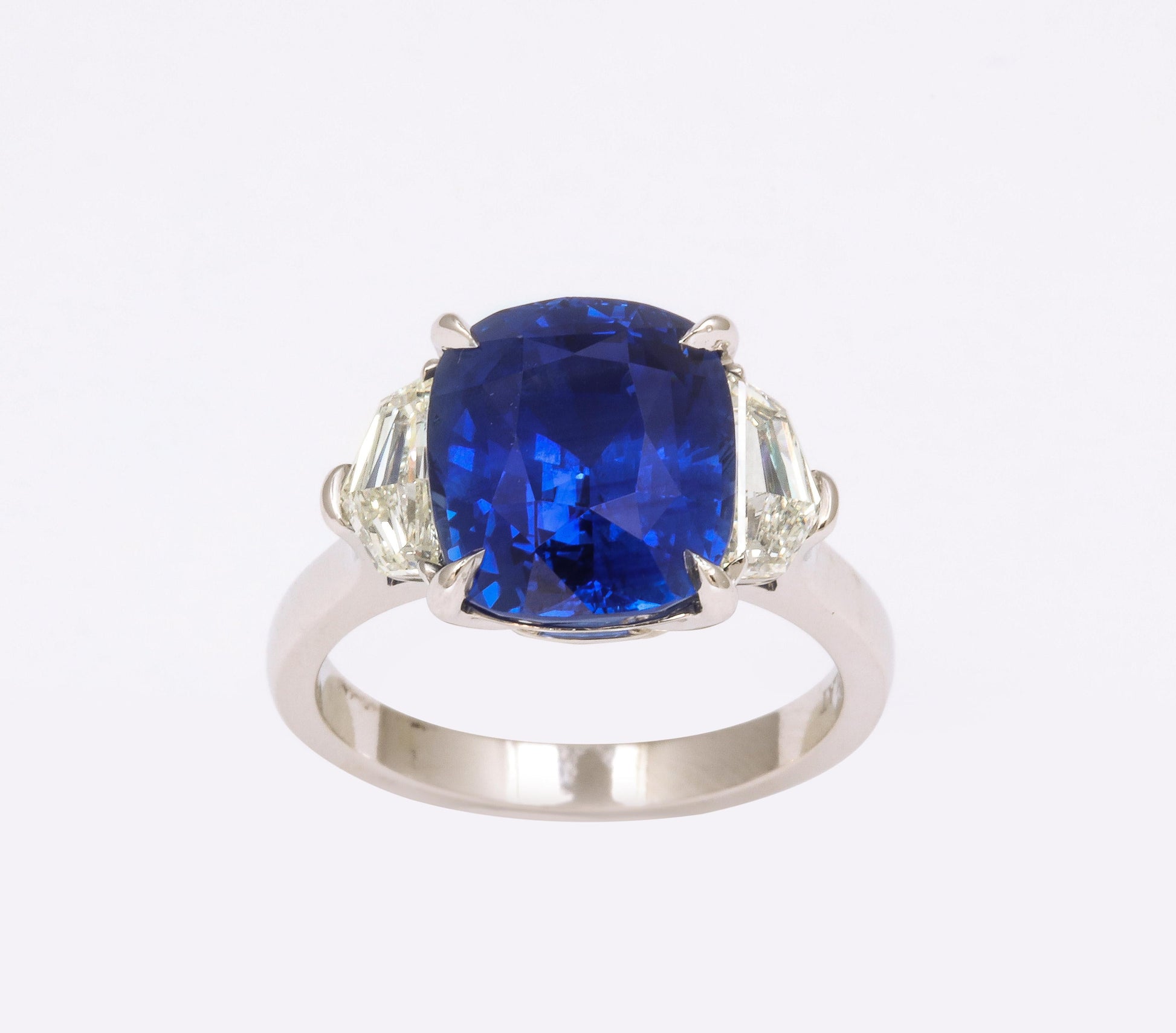 https://a.1stdibscdn.com/7-carat-cushion-cut-sapphire-and-diamond-ring-for-sale-picture-6/j_415/j_144397121641926941690/6R1A8305_master.jpg