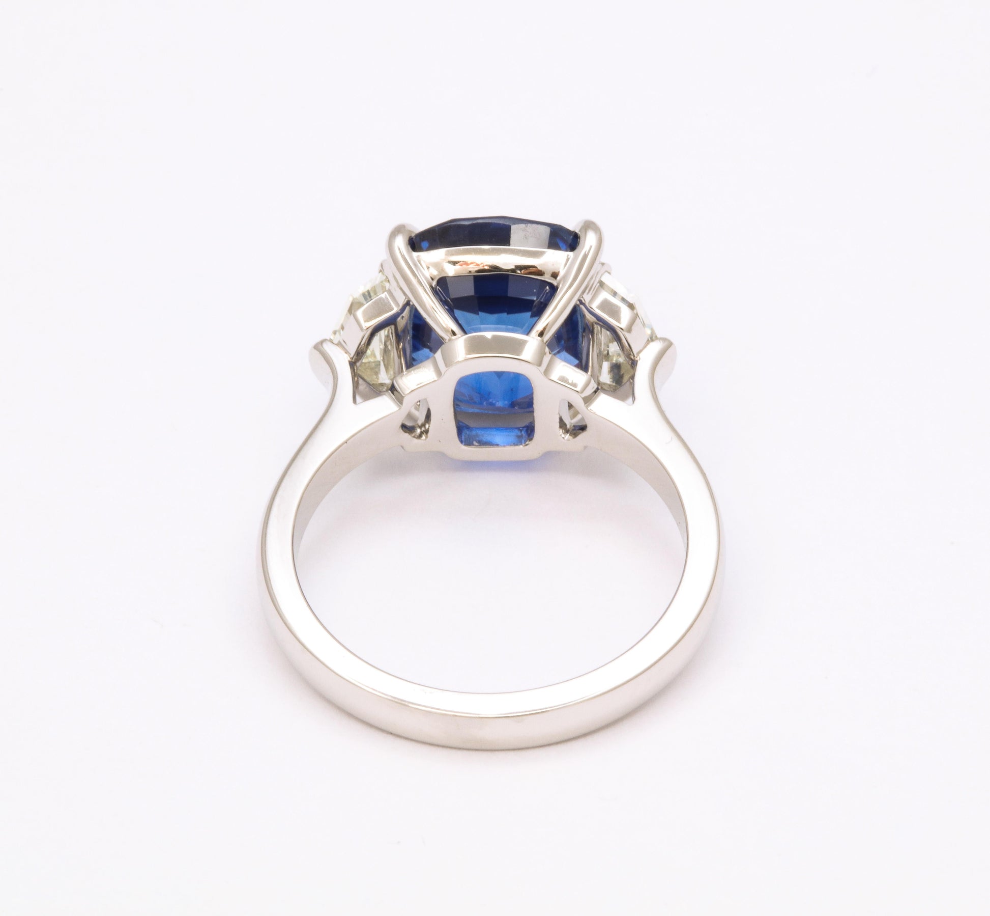 https://a.1stdibscdn.com/7-carat-cushion-cut-sapphire-and-diamond-ring-for-sale-picture-8/j_415/j_144397121641926940334/6R1A8308_master.jpg