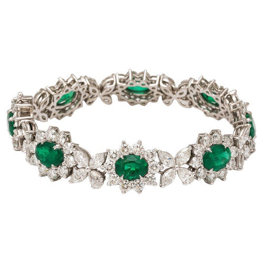 https://a.1stdibscdn.com/emerald-and-diamond-bracelet-for-sale/j_415/j_224079721711375670124/j_22407972_1711375671331_bg_processed.jpg?width=768