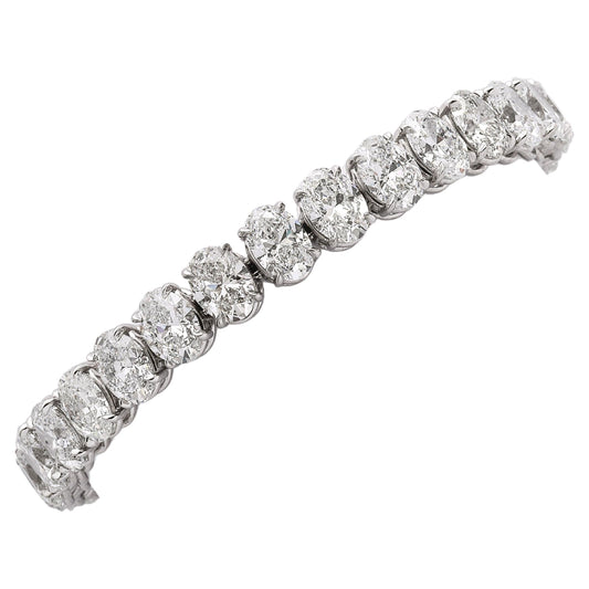 https://a.1stdibscdn.com/oval-diamond-tennis-bracelet-for-sale/j_415/j_232203621718979996847/j_23220362_1718979997677_bg_processed.jpg